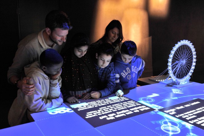 Visitors on the Capital Concerns interactive © Museum of London.jpg